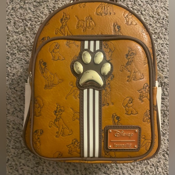 LOUNGEFLY DISNEY DOGS BACKPACK Loungefly Disney Dogs Backpack AOP HTF Rare paw - Picture 1 of 11